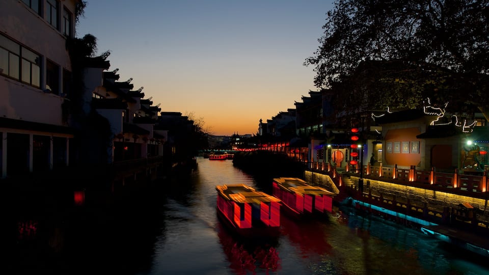 Nanjing featuring night scenes, a river or creek and a sunset