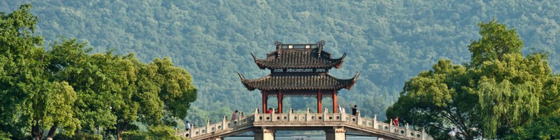 Ancient bridge over a lake, China