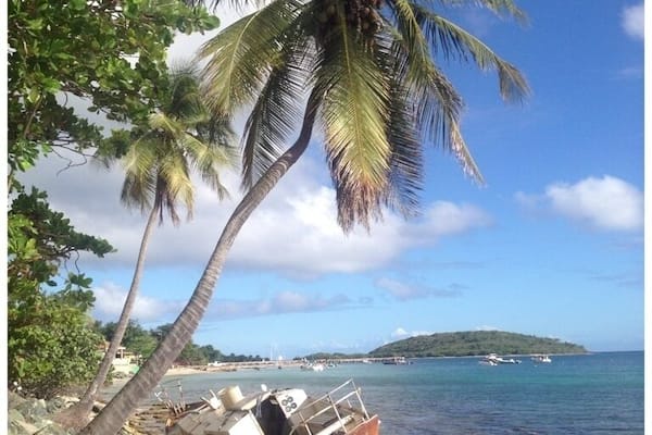 Swing by the restaurants along the water and you'll find amazing views and this washed up sailboat
