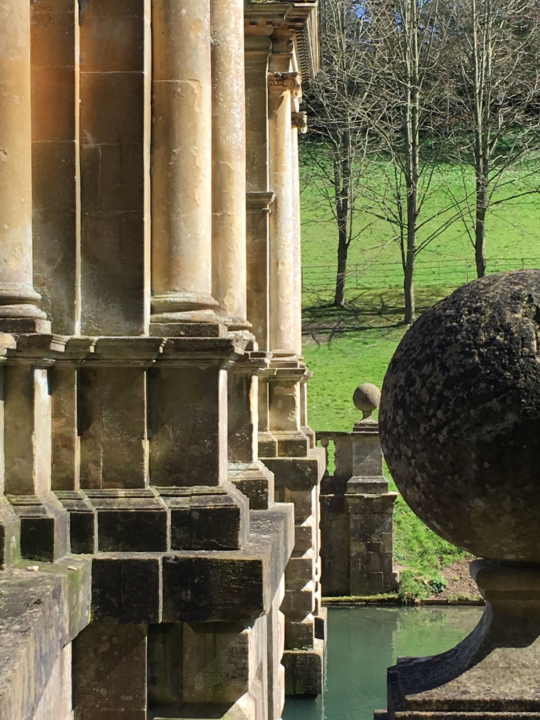 Lovely place for a gentle walk punctuated by the smell of wild garlic: its worth noting that there is no on site parking and no roadside parking near the entrance .
Although designed to feel natural its only the bridge and reflecting lakes that are photogenic   