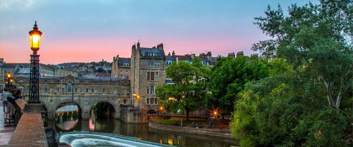 Pulteney Bridge at sunset in Bath, England.