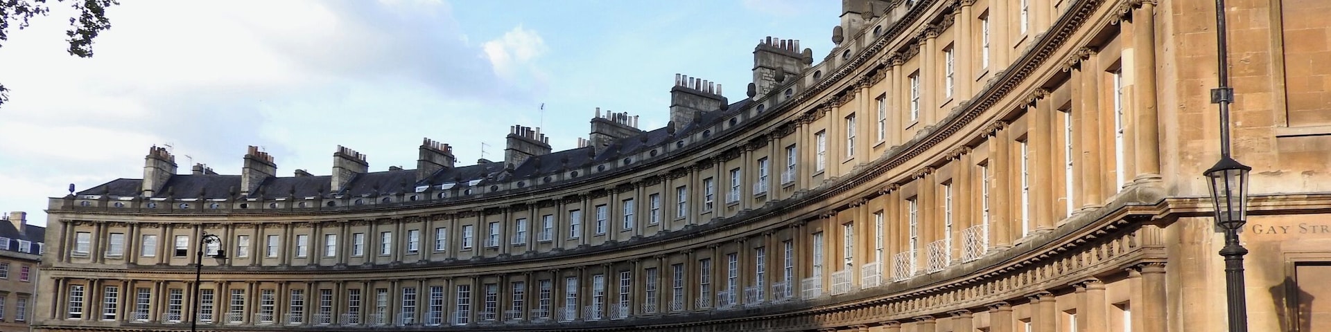 The Circus is historic circle of upscale townhouses in the city of Bath, Somerset, England. Designed by the prominent architect John Wood, the Elder, it was begun in 1754, completed in 1768, and is regarded as a preeminent example of Georgian architecture. The name comes from the Latin 'circus', which means a ring, oval or circle.
#InStone #OnTheRoad