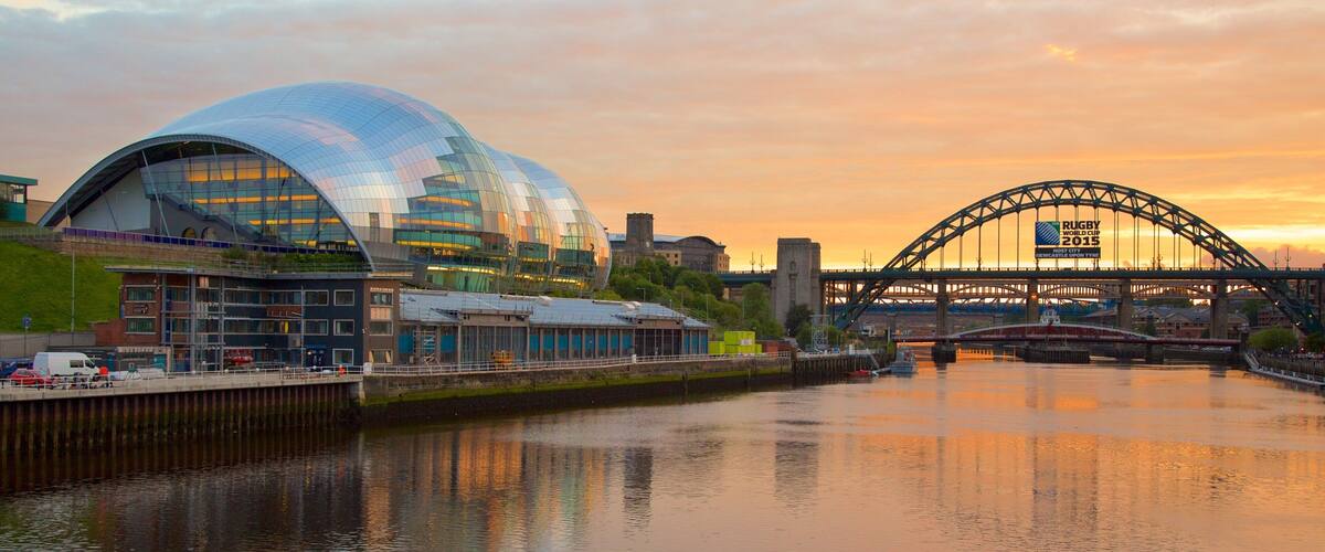 Newcastle-upon-Tyne featuring a sunset, a river or creek and a bridge