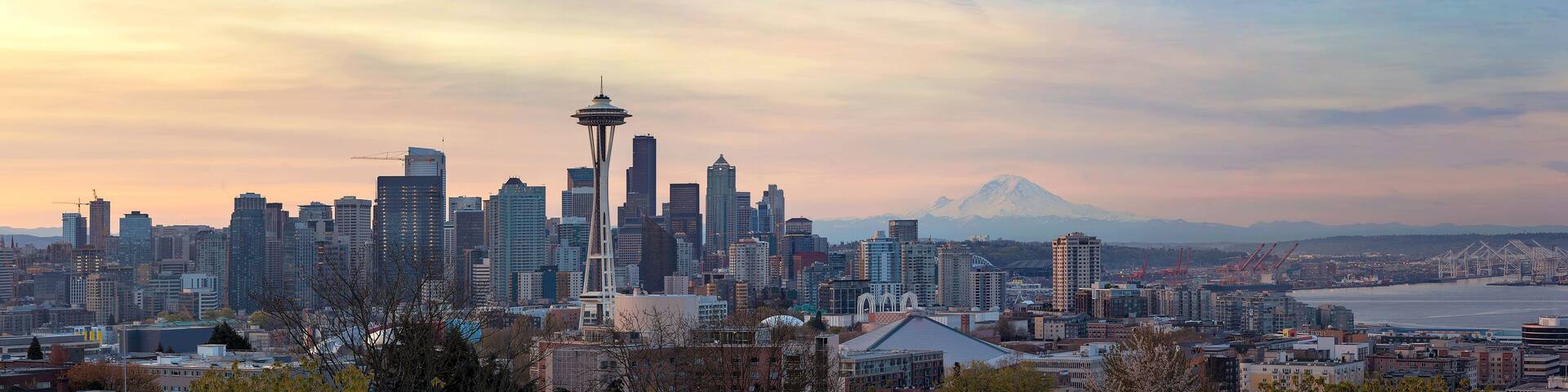 Seattle WA Skyline with Mount Rainier during Sunrise Panorama in Washington state USA