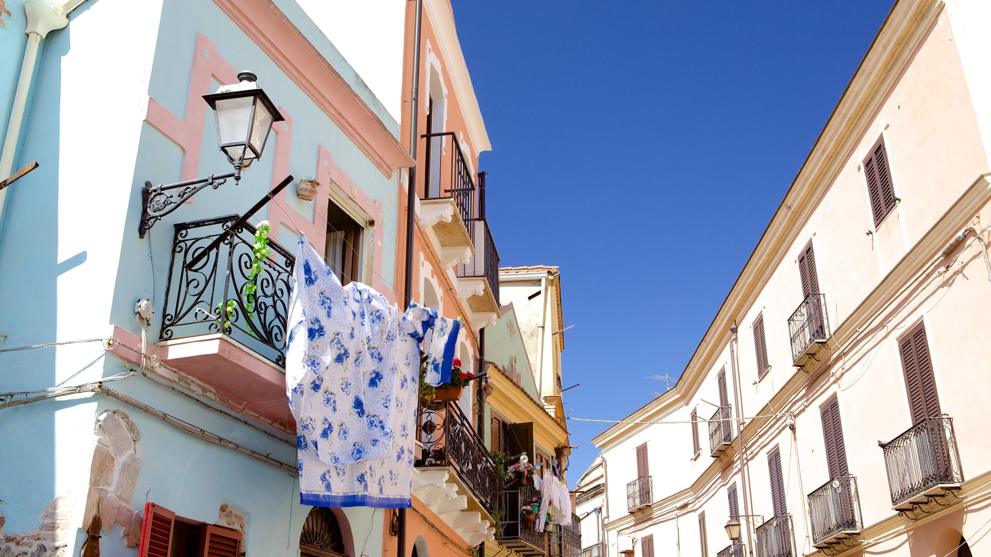 Iglesias which includes a house, street scenes and a small town or village