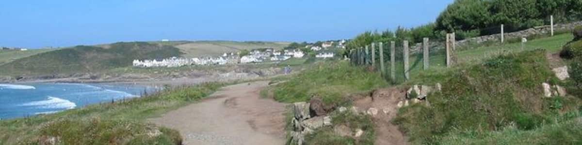 South West Coast Path Polzeath Cornwall Looking NE, New Polzeath in the distance.
