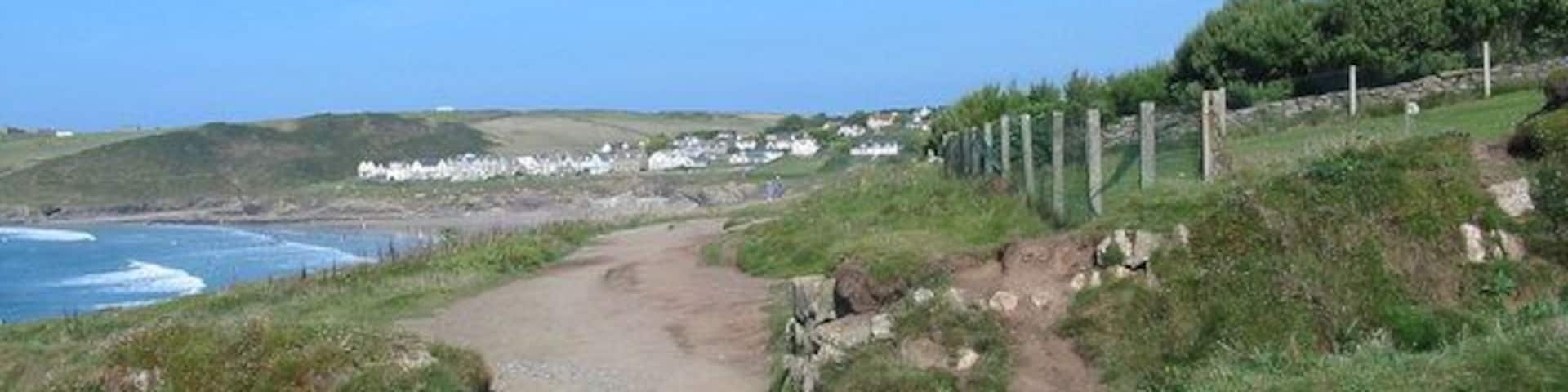 South West Coast Path Polzeath Cornwall Looking NE, New Polzeath in the distance.