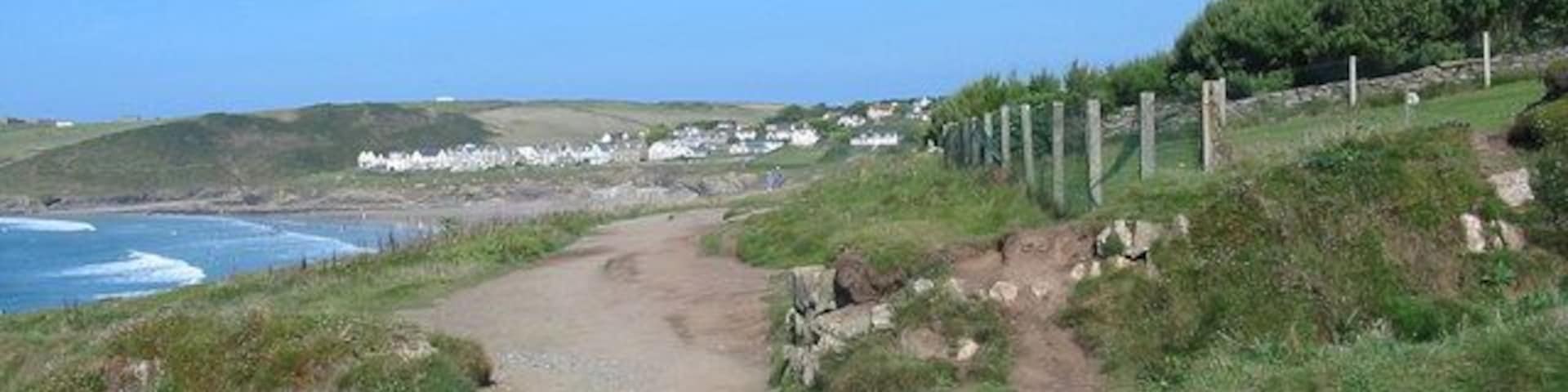 South West Coast Path Polzeath Cornwall Looking NE, New Polzeath in the distance.