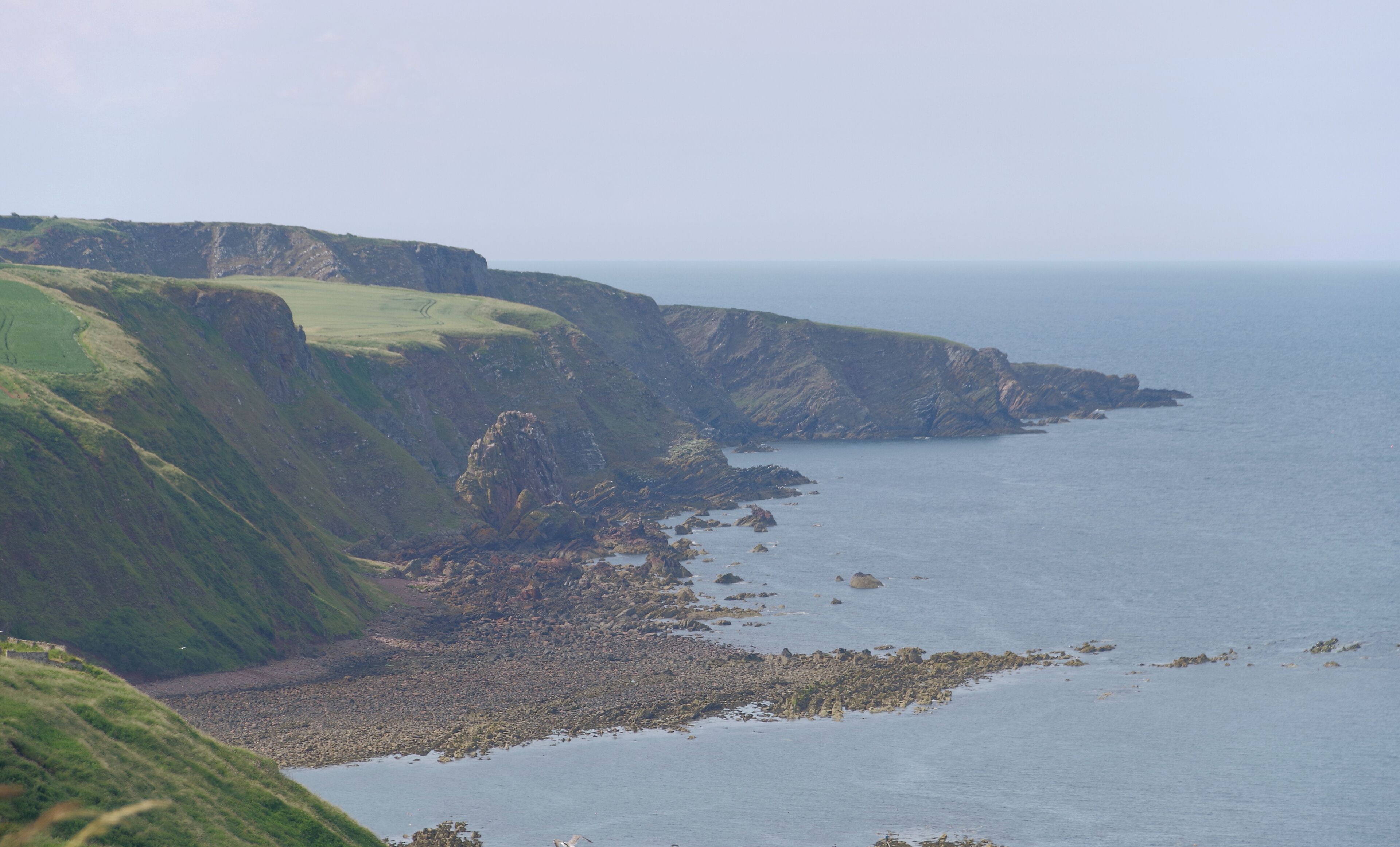 The cove at Burnmouth, seen from a layby on the A1(M).