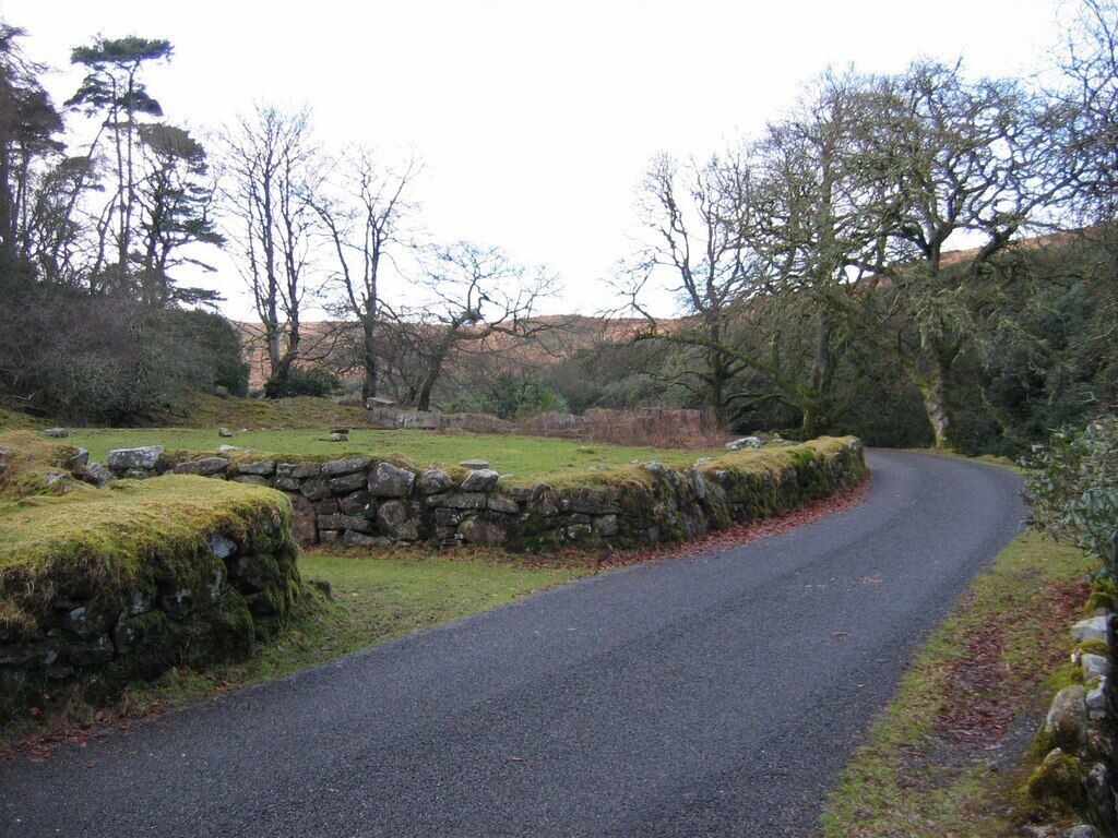 The remains of Brent Moor House. A former entrance into the garden of the demolished Brent Moor House, with the remains in the distance. The road is the access road to the Avon Dam. See also 1765058.