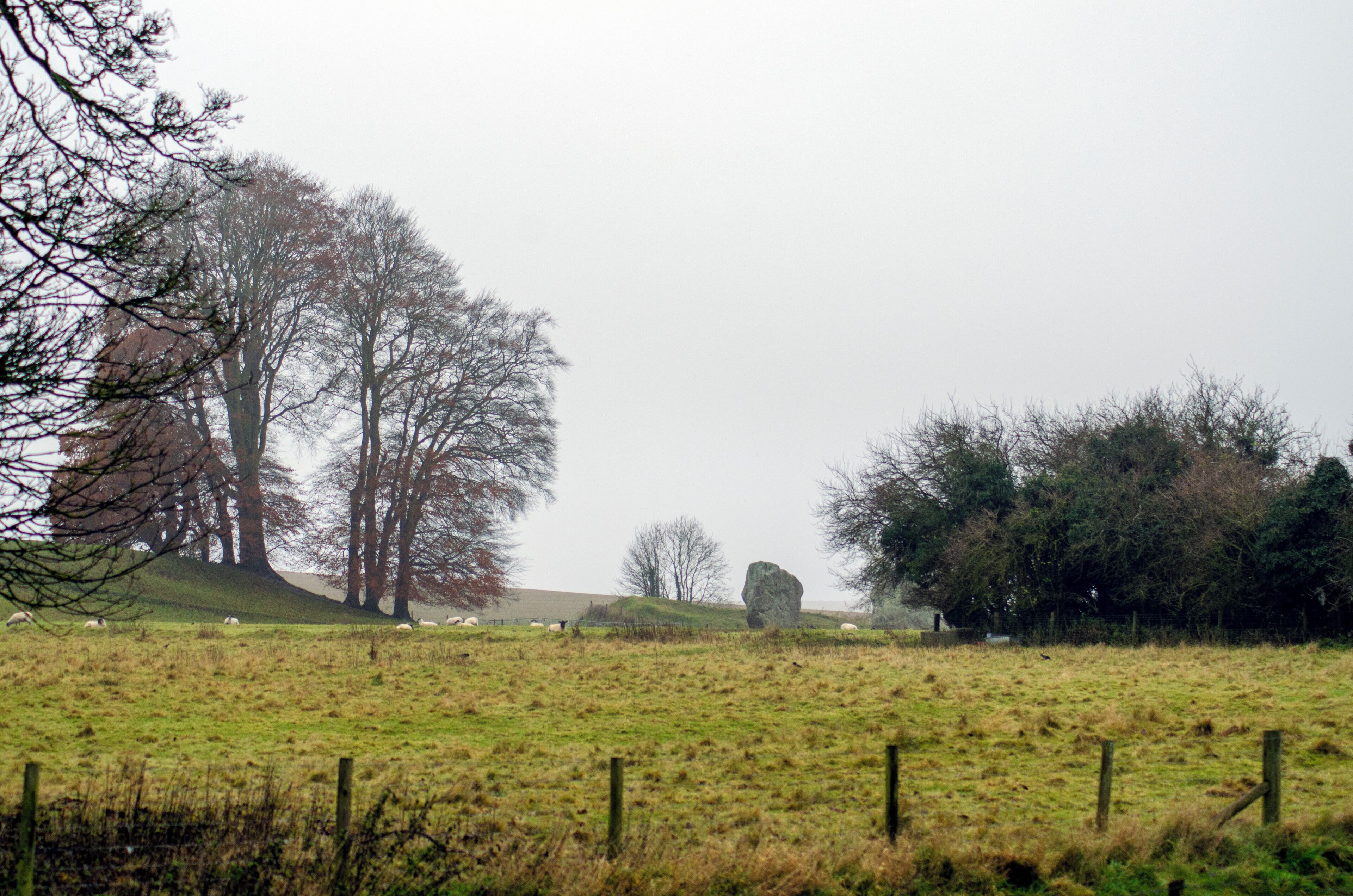 Ancient stones surround and cut through the delightful village of Avebury.
