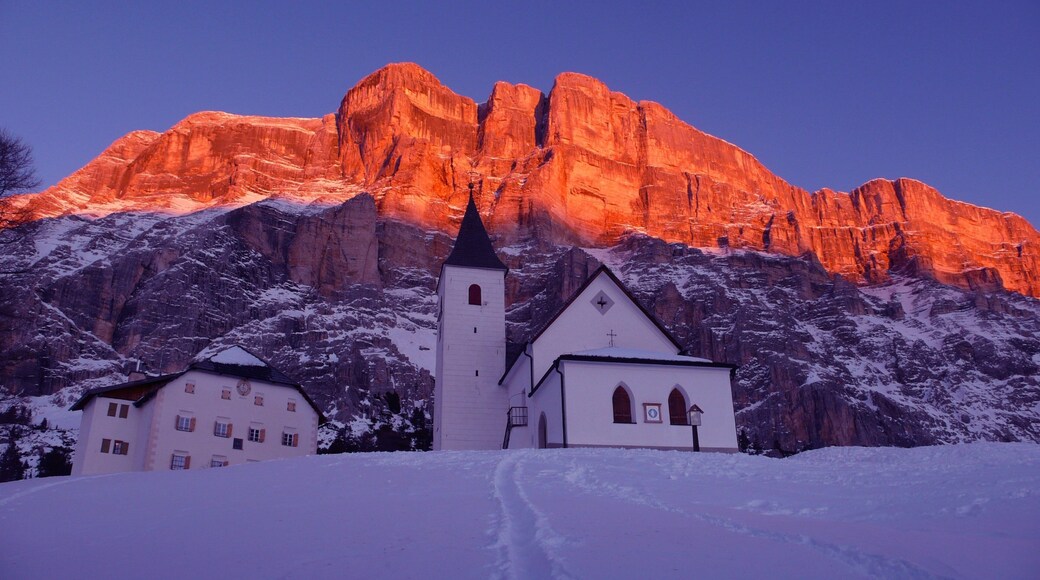 Alta Badia showing mountains, a church or cathedral and snow