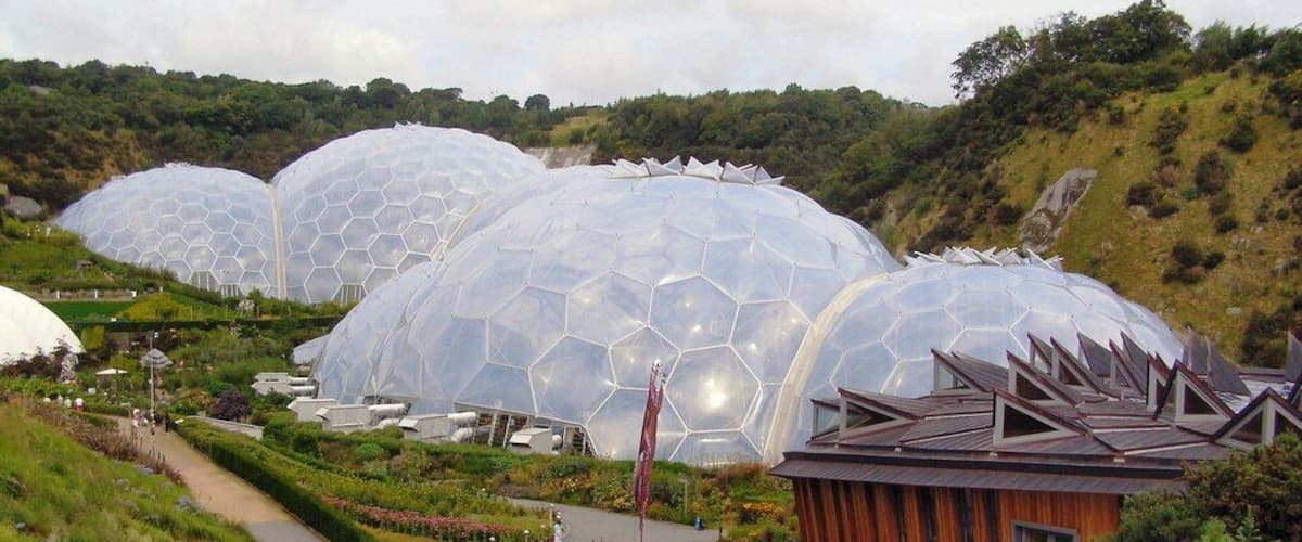 Eden Project View from the bridge. Looking past the Education Resource Centre to the Warm Temperate Biome. Behind is the Humid Tropical Biome