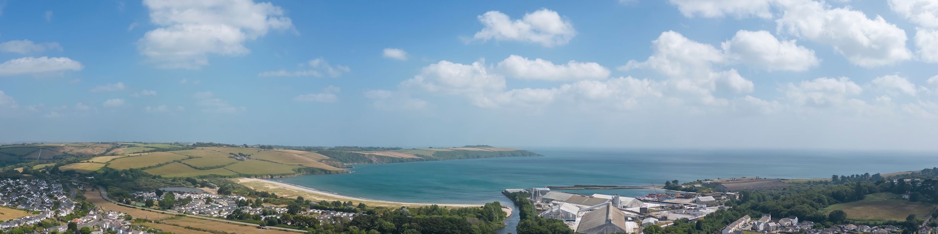 An aerial view looking across the town of Par towards the beach in Cornwall, UK