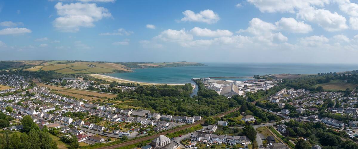 An aerial view looking across the town of Par towards the beach in Cornwall, UK