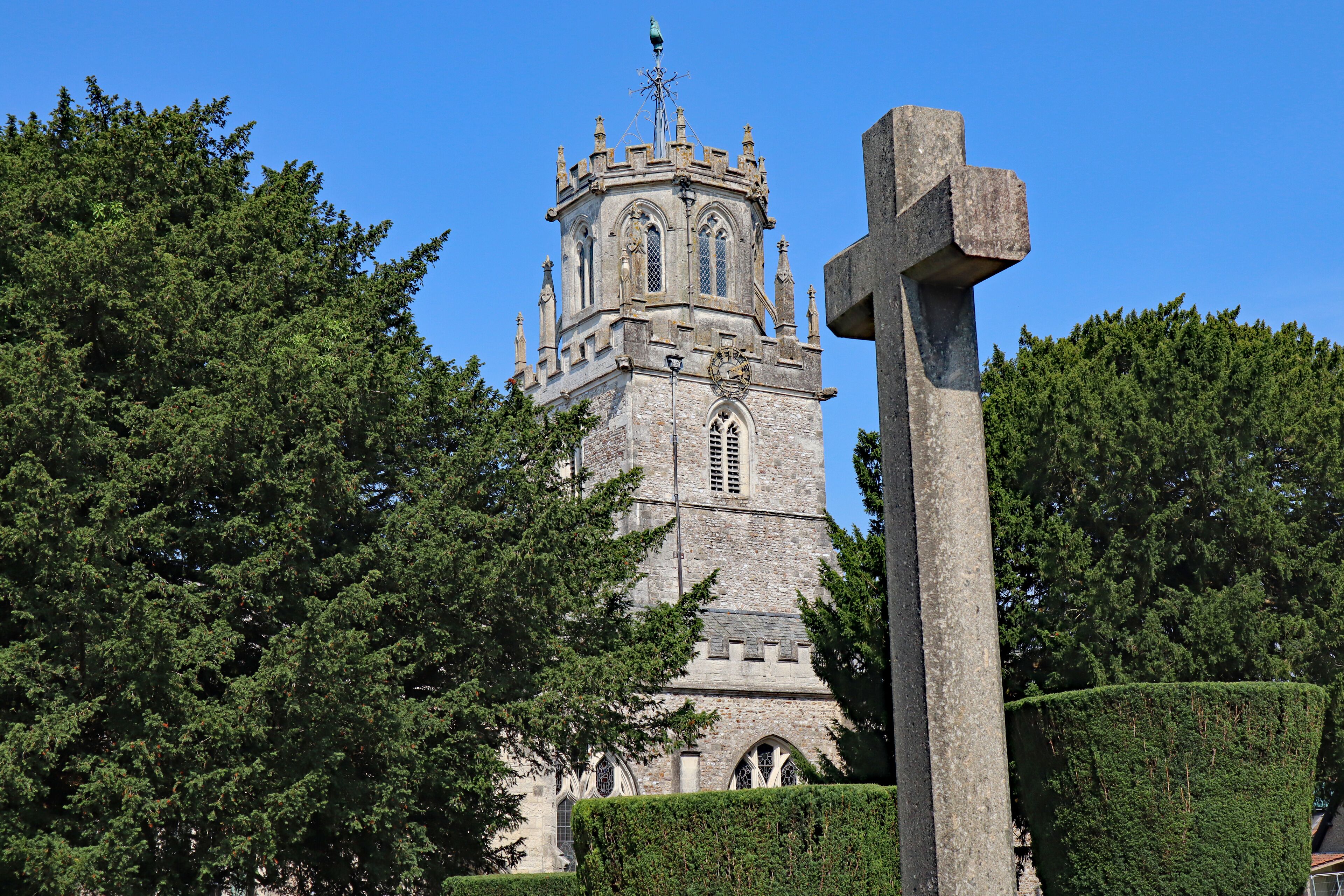 A cross stands in front of the village of Colyton in Devon