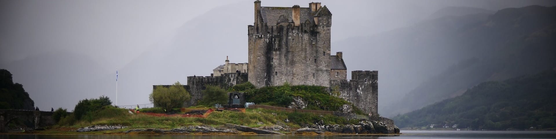 The most photographed Castle in Scotland.Eilean Donan castle appearing out of the mist.