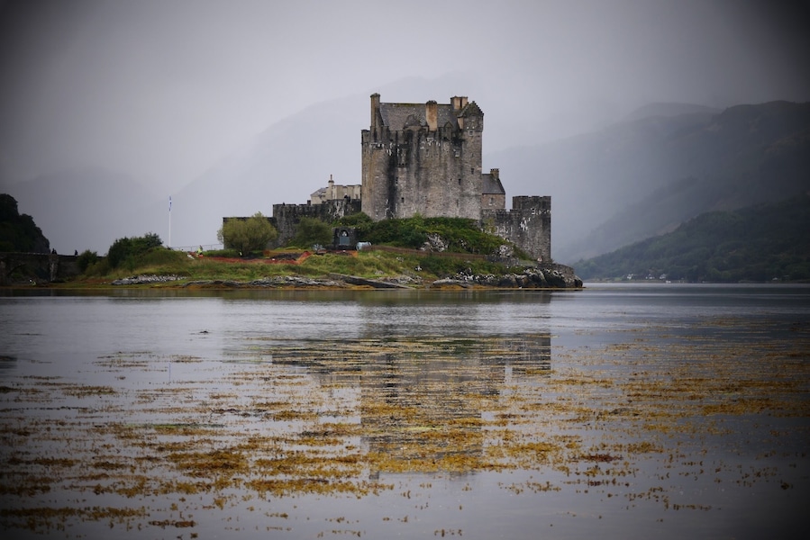 The most photographed Castle in Scotland.Eilean Donan castle appearing out of the mist.