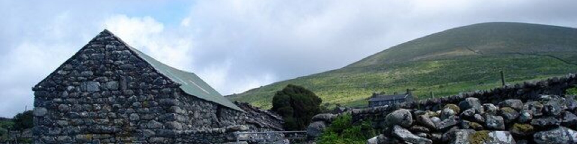 A Rhinog Barn This sturdy barn at 607247 is typical of the area below the slopes of Moelfre. Its name is Bron-y-Foel-Ganol.