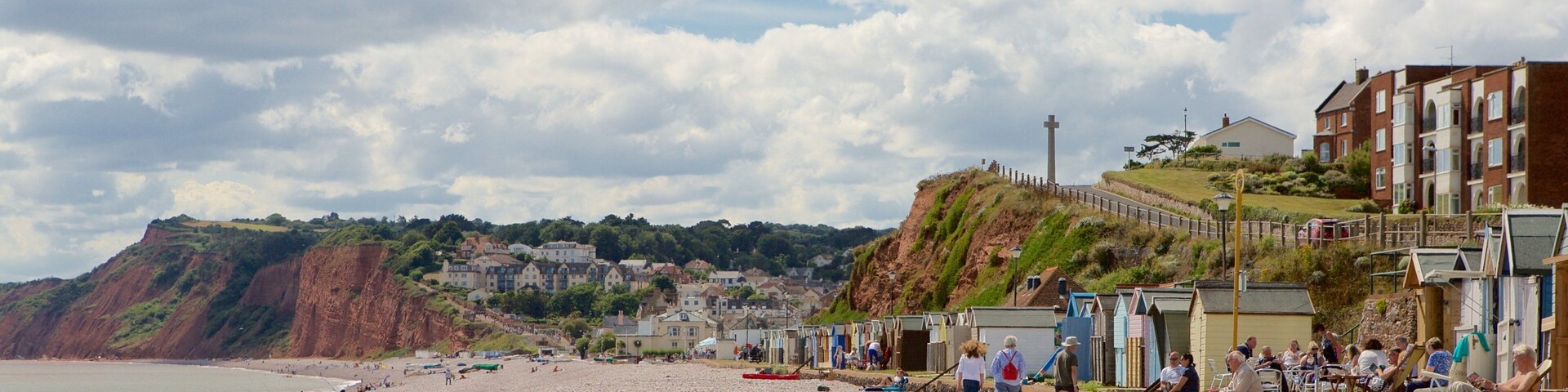 Budleigh Salterton which includes rugged coastline, a coastal town and a beach