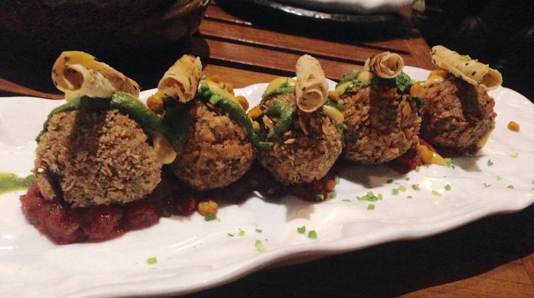 #delicious
Dal Chawal Arancini served with rolled-up papad on a bed of onion chutney in an entirely Sicilian presentation but a flavour that is the pure north Indian comfort food of lentil, rice and pickle.