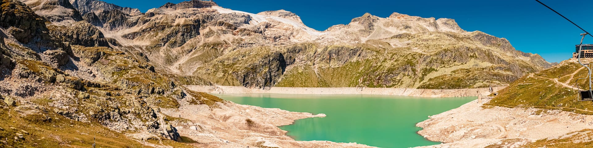 High resolution stitched panorama with reflections in a lake at the famous Weisssee Gletscherwelt, Uttendorf, Salzburg, Austria