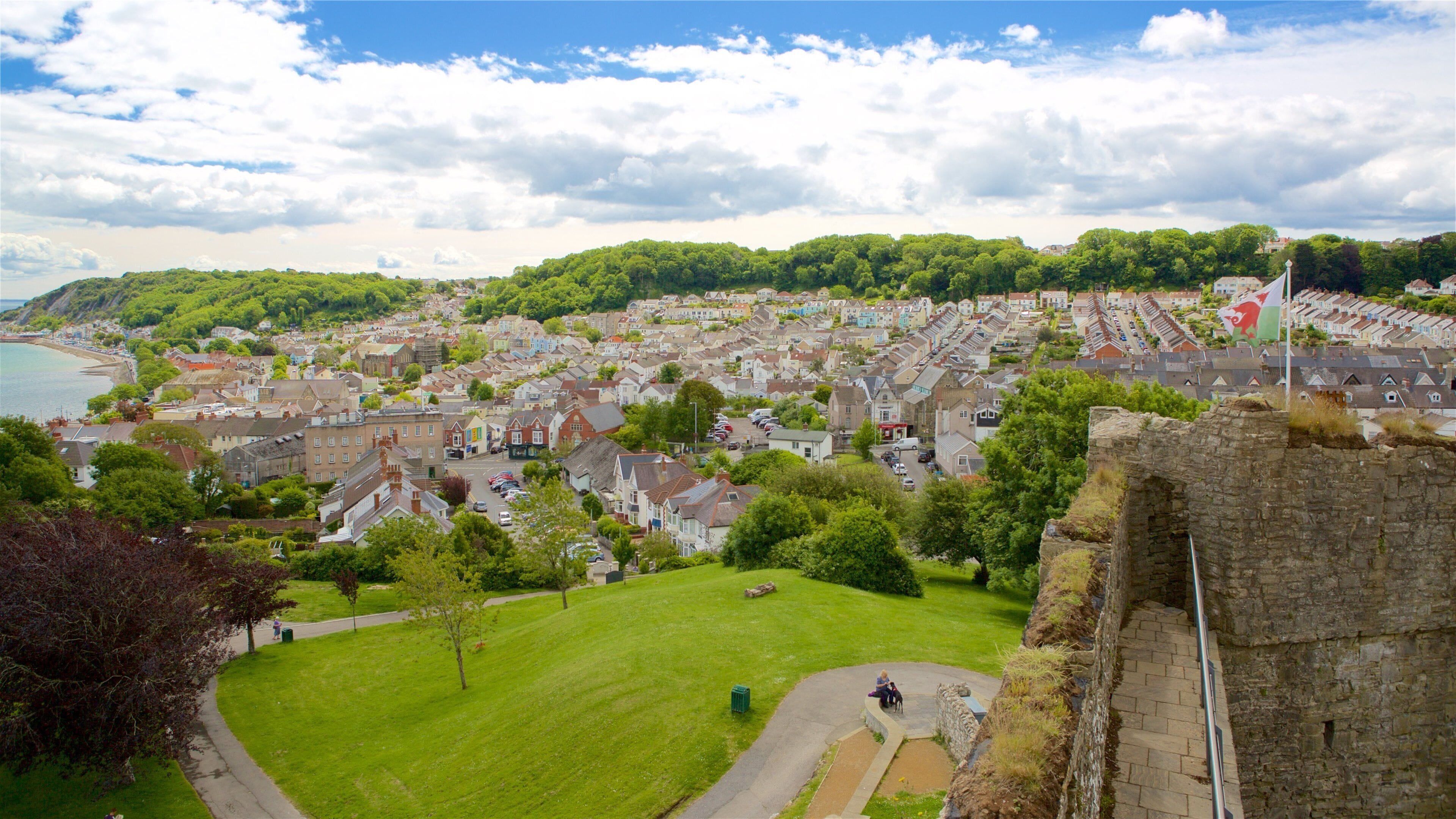Mumbles which includes a small town or village, heritage elements and views