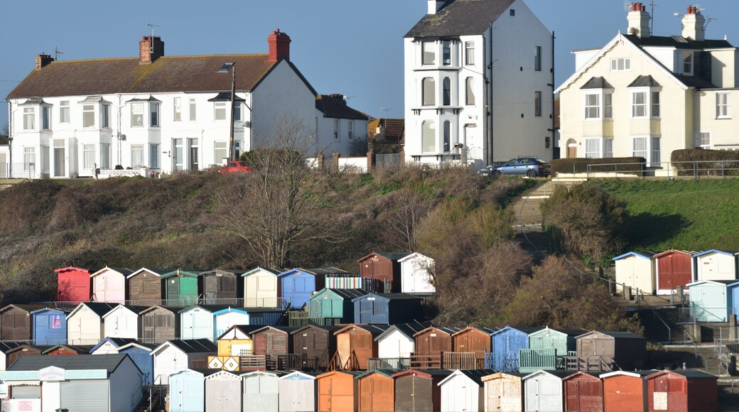 View of Beach huts and houses at Walton on Naze