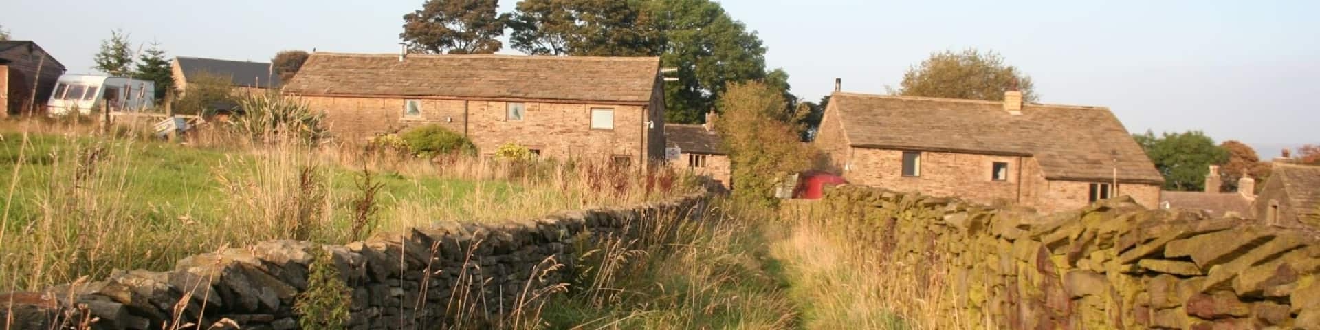 Grade II listed barns in Whitle, near New Mills, Derbyshire. This is a photo of listed building number 1088129.
