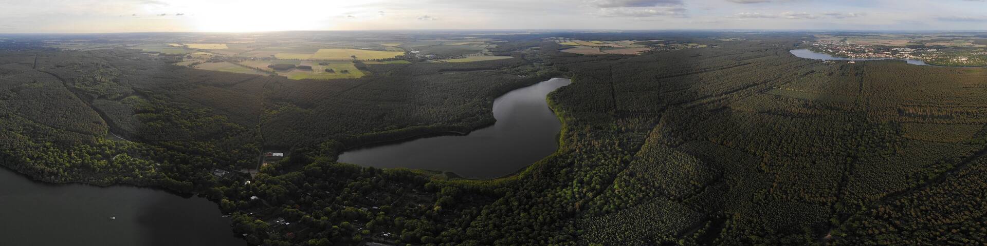 Aerial view of lake Fängersee near Strausberg (Brandenburg). Surrounding villages are Hirschfelde, Altlandsberg and Petershagen-Eggersdorf. The lake is located in the catchment area of Strausberg