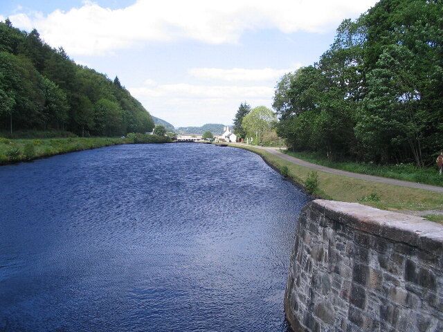 Downhill from lock no. 10, Crinan Canal Taken from no. 10 lock gate looking towards lock no.11 and Crinan beyond. A breezy day, as can be seen by the water surface.