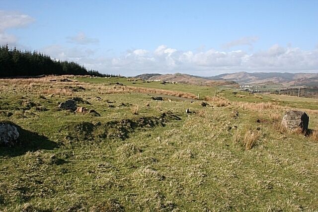 Near Cairnbaan This open plateau is the site of several cup-and-ring-marked surfaces. It has a good view in most directions, and this may be one of the reasons why it was chosen by the ancient sculptors.