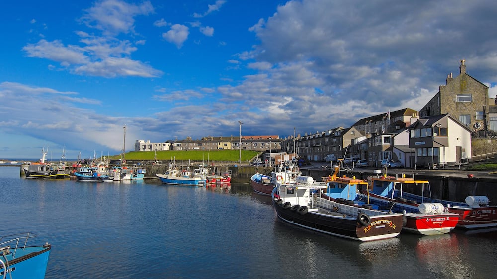 ECY532 Fishing boats in harbour, seahouses, Northumberland, England, UK, Europe