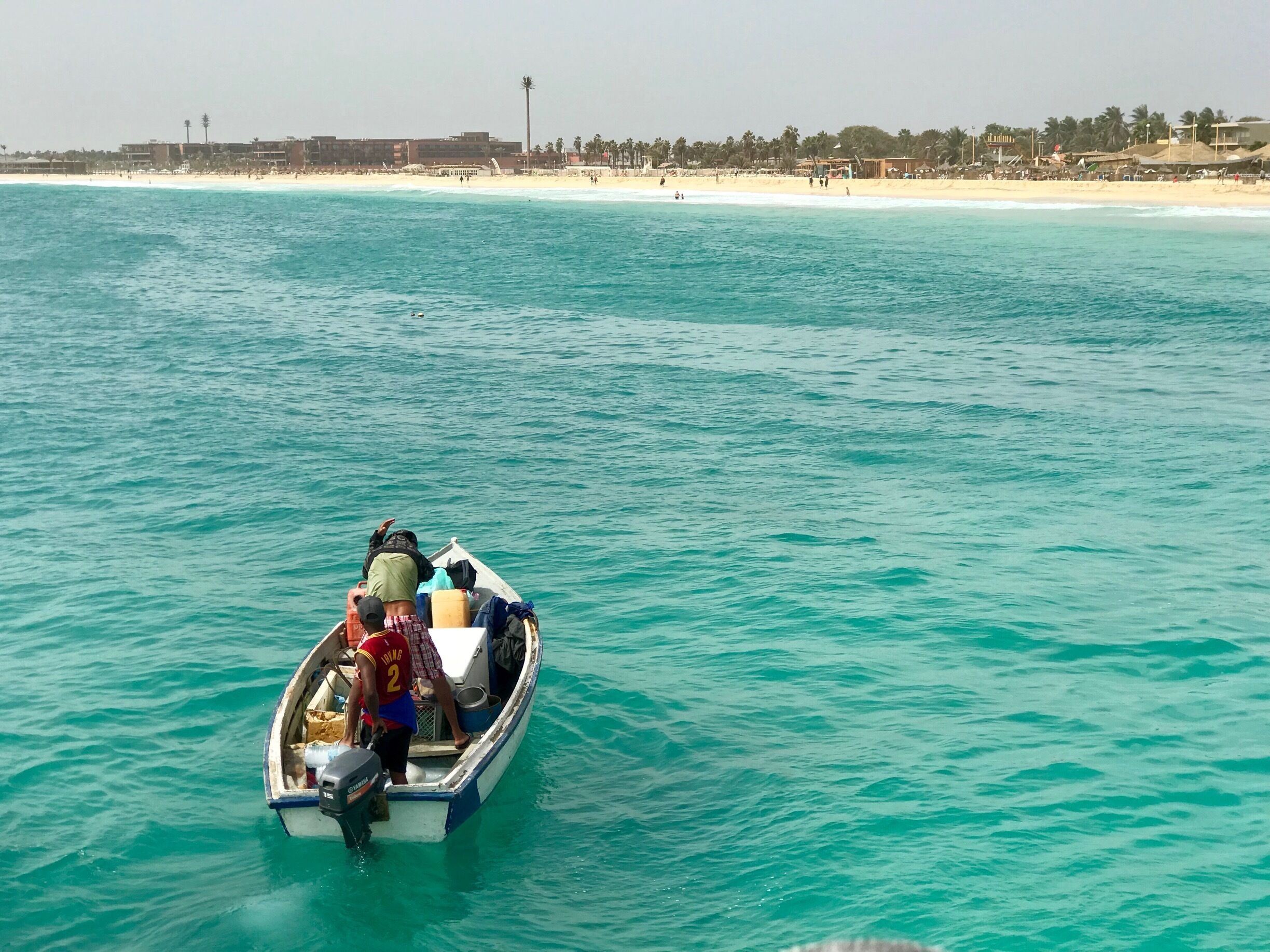 Local fisherman returning with the day’s catch, off Santa Maria pier in Sal, Cape Verde. A bustling fish market run directly from the pier! #caboverde 
