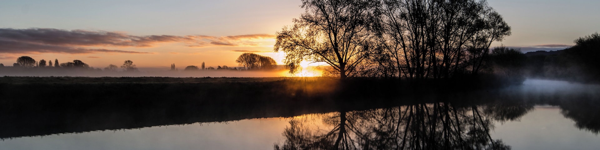 Eckington Bridge, the Avon completely still, almost no breeze, nesting Curlews calling from the hay meadow on the other bank, the sun rising through the mist, grass soaked in dew. Just me and another photographer. It's what we get out of bed at unearthly hours for.