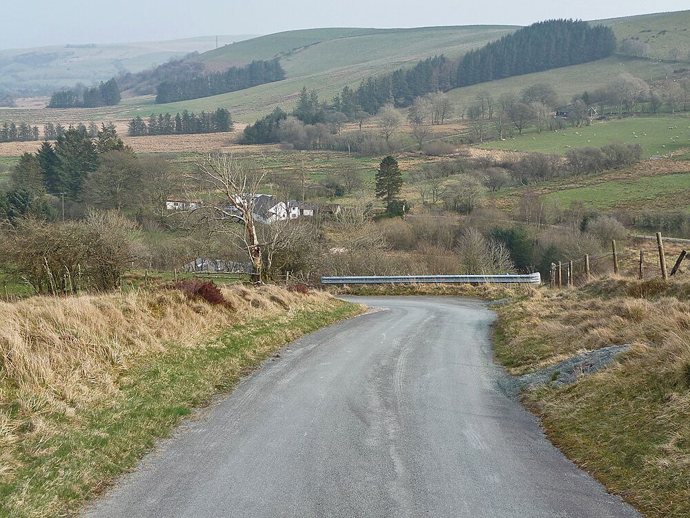 Steep road in Cwm Troedyresgair In its climb up the cwm away from the floor of the Gwy/Wye valley.