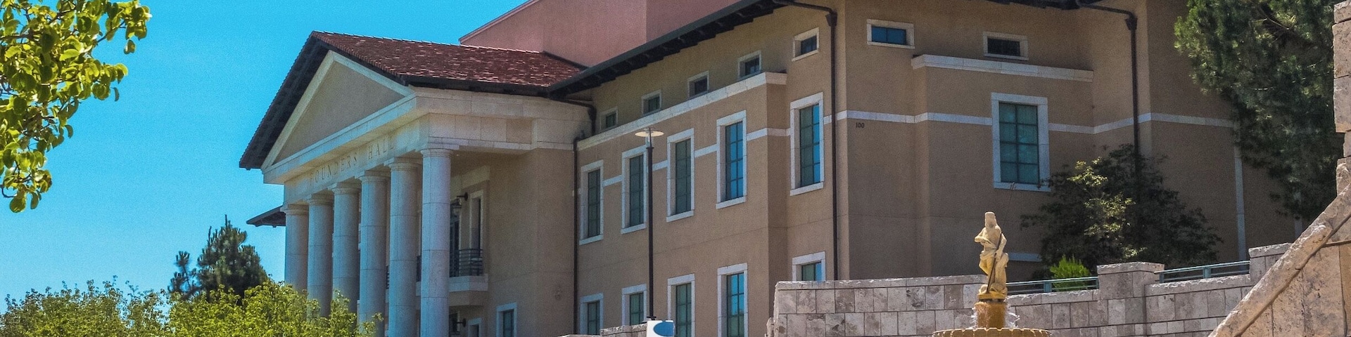 Soka University is probably the best-kept secret in all of Orange County, and probably all of California itself.  You mention it to the locals and they just give you blank stares.
But it is the kind of place that will stick in your memory for the rest of your life.  The grounds of the campus are situated at the ridge between Aliso and Wood Canyons, and command a view of the area that can only be described as staggeringly beautiful.
To say those canyons have competition from the scenery inside the grounds is to make the understatement of this young century.
Established just fifteen short years ago, the university seems to have spared no expense to build a campus worthy of its purpose.  Here, you will find a delicate balance of architectural styles - heavily influenced by the very early European Renaissance, but containing elements of post-modernism, classical Greek, medieval Italian and even a hint of Empiric Spain.
But it isn't just a pretty face.  The school has been consistently voted best in its treatment of its freshman class.  It requires one semester study abroad, and has partnered with universities all over the world to make that a reality.
I'm afraid I didn't do too much looking into the academic side of the house.  I was really too overwhelmed by its beauty.
And its calm.  Come here on a weekend day and you'll spend most of the time in solitude.  This was a welcome change from the parking lot called Highway 1, which took up the bulk of my late afternoon a day earlier.
I could breathe in this place, move from one astounding sight to another and just feel the calm descend over me.
That no-one in Southern California seems to know it exists is almost a comfort, really.  It might mean that my second visit, whenever that may happen, will be as blissfully free of the tourist trappings as the first.
Either way, though, I just can't wait to go back.
I've posted a large gallery of shots on my blog, some of which will appear here on Trover.  If you're looking for the full set, just follow this link: http://www.shootthesun.com/weblog/?p=2223