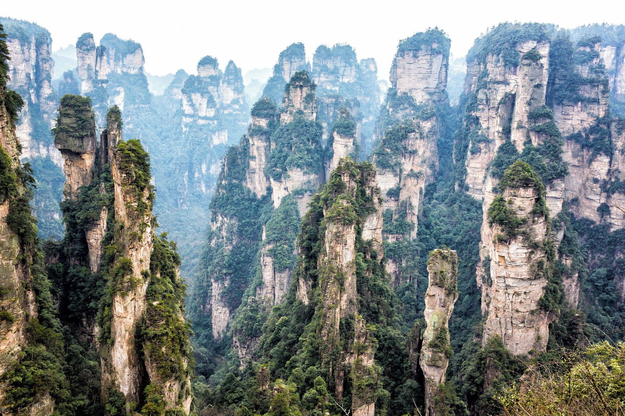 Zhangjiajie, China. This landscape inspired the scenery in the movie "Avatar." For more photos, check out this link:  http://www.earthtrekkers.com/photo-tour-of-zhangjiajie/