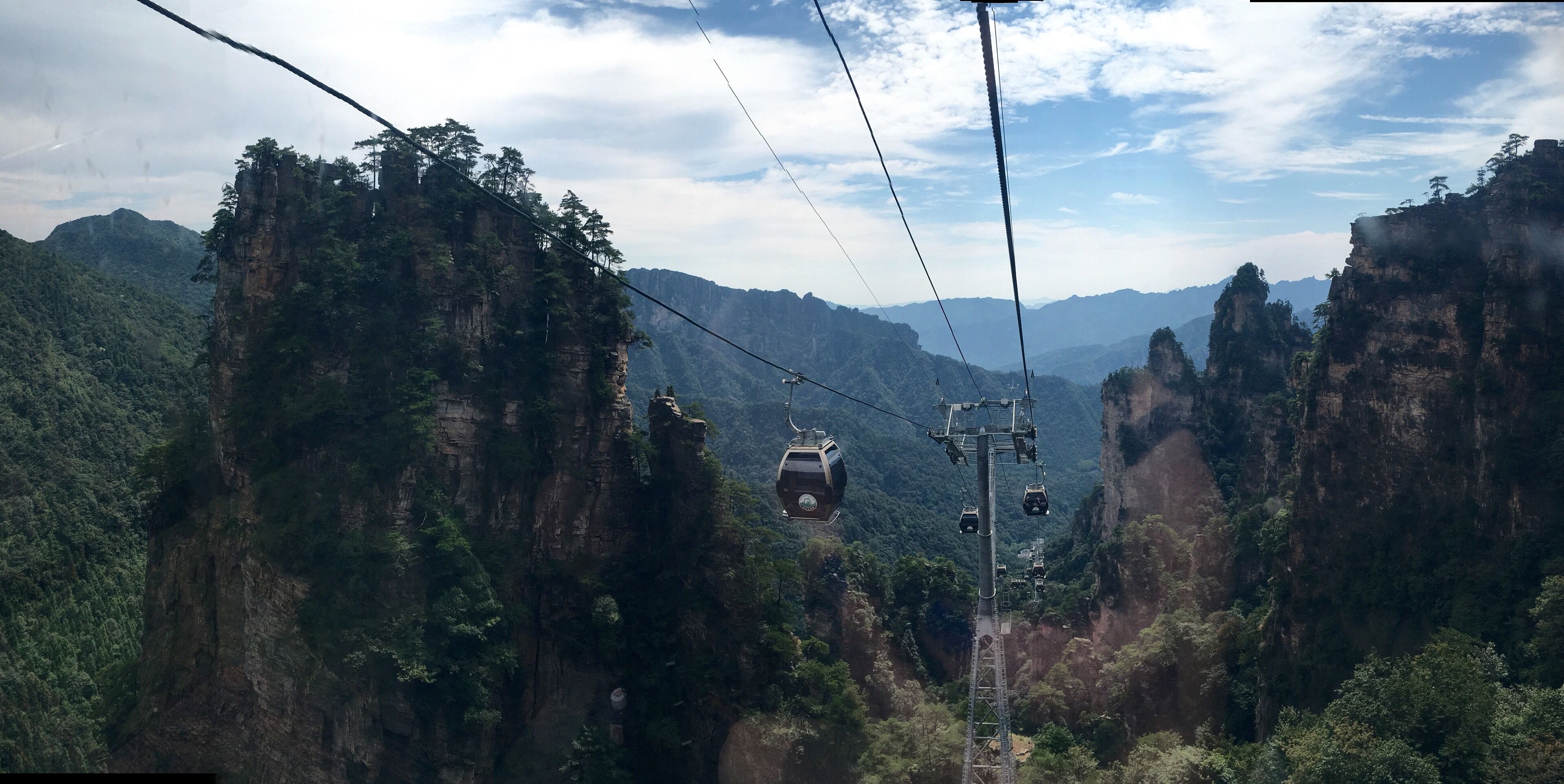 Take the trip with the cable car to get closer to the floating mountains