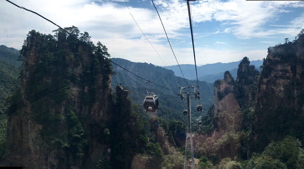 Take the trip with the cable car to get closer to the floating mountains