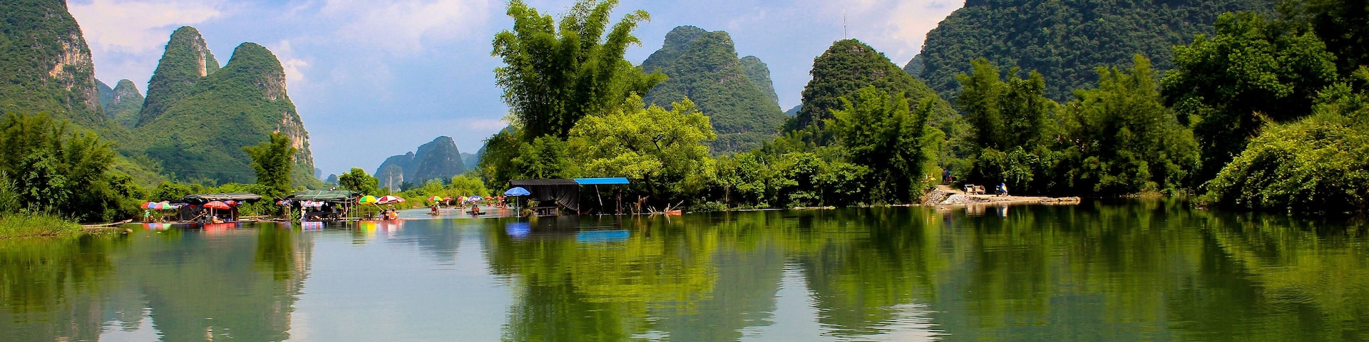 Floating down the Li River just outside the picturesque town of Yangshuo in Southern China #Trovember