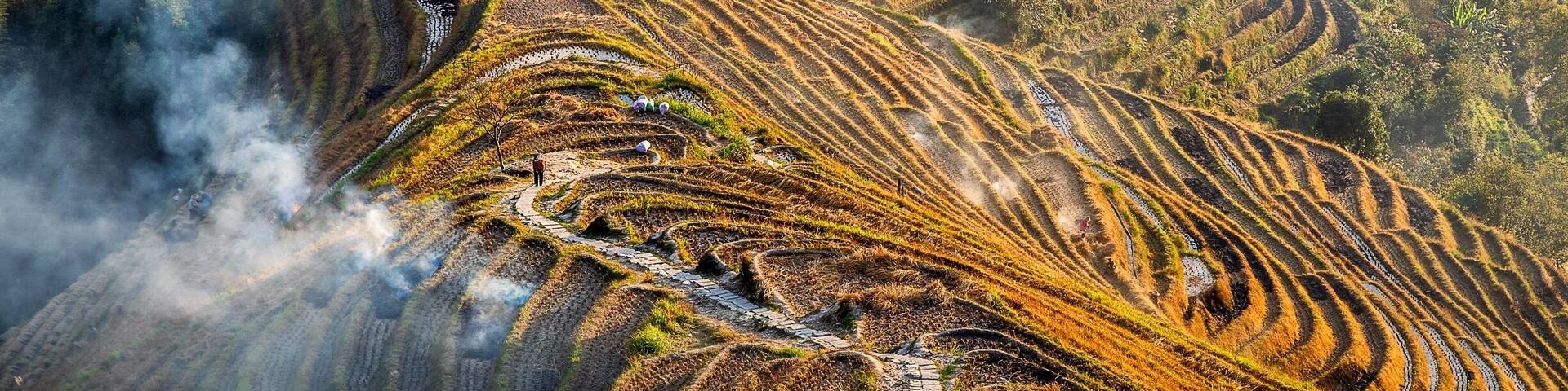 When the harvest is done it’s time to prepare for winter. Any of the rice hay not required for animal feed is burned in the terraces. Climb to the top of the village and beyond to a great scenic spot for sunset and just gaze as the villagers set about their daily tasks. Such a great view at any time but aim to get their for sunrise or sunset for the best light on the valleys and terraces. You can visit all year round, but for the best reflections in the rice terraces aim to be here in April or May when they irrigate the fields.