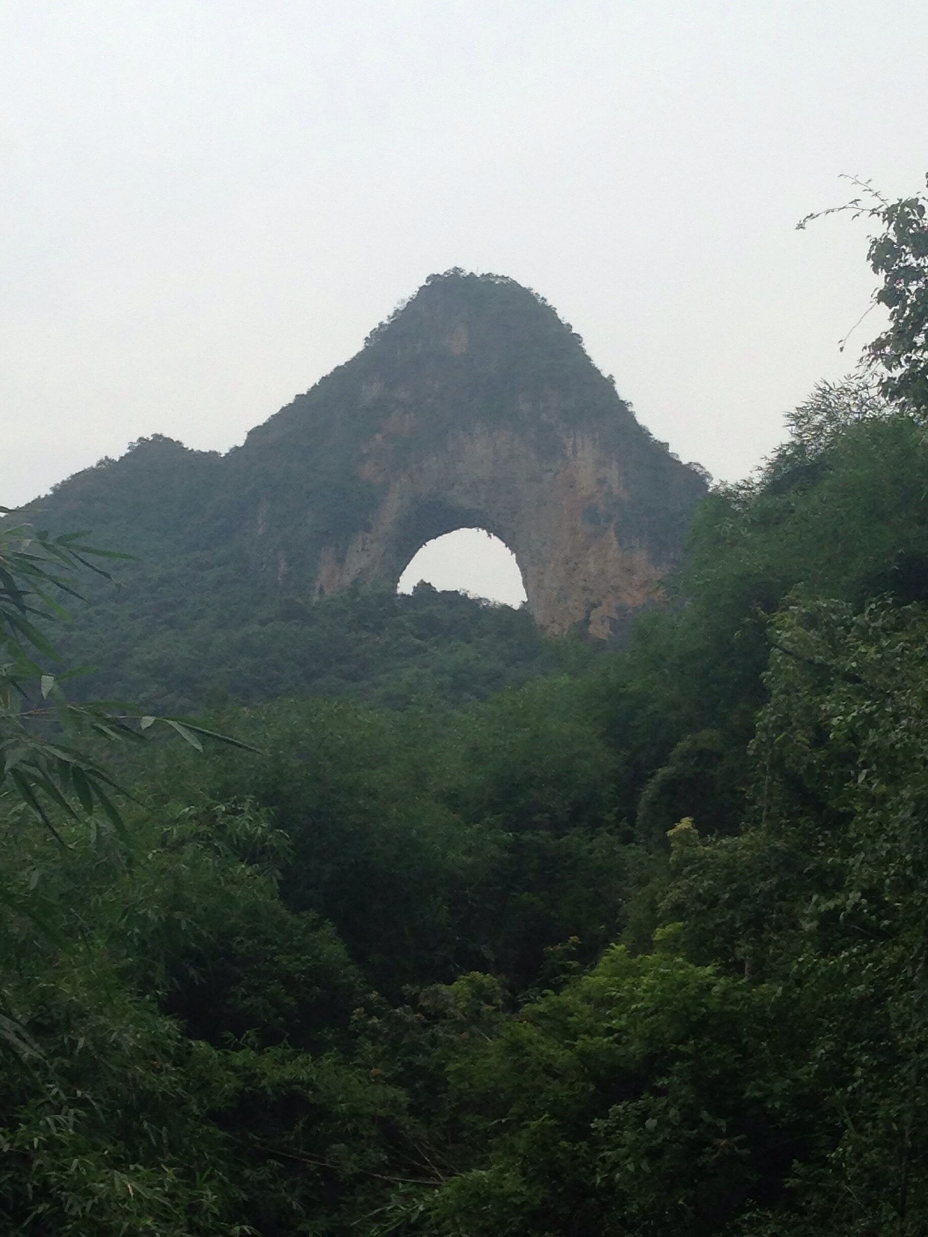 A plane takes you to Guilin, a bamboo raft takes you down the Li River to Yangshuo, a rented bicycle takes you to the entrance of Moon Hill, but only yourself can hike to the most spectacular view. Surrounded by karst mountains, this is truly a one of a kind place. #hiking #yangshuo #china