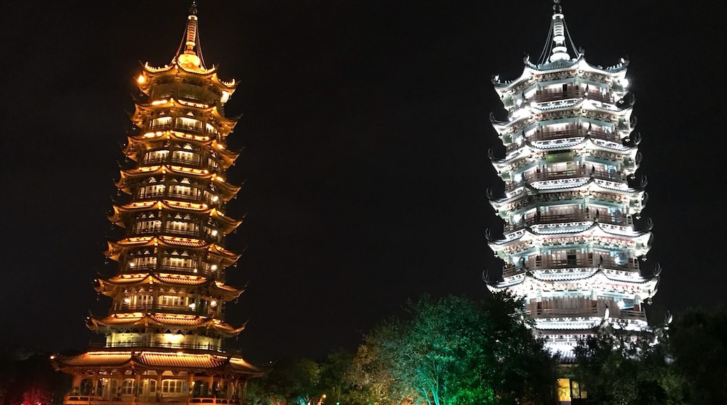 Located in Guilin, Two Rivers and Four Lakes Scenic Spot refer to the landscape - Sun and Moon Pagodas - Mulong Pagoda was built by imitating Longhua Pagoda in Song Dynasty in Shanghai.