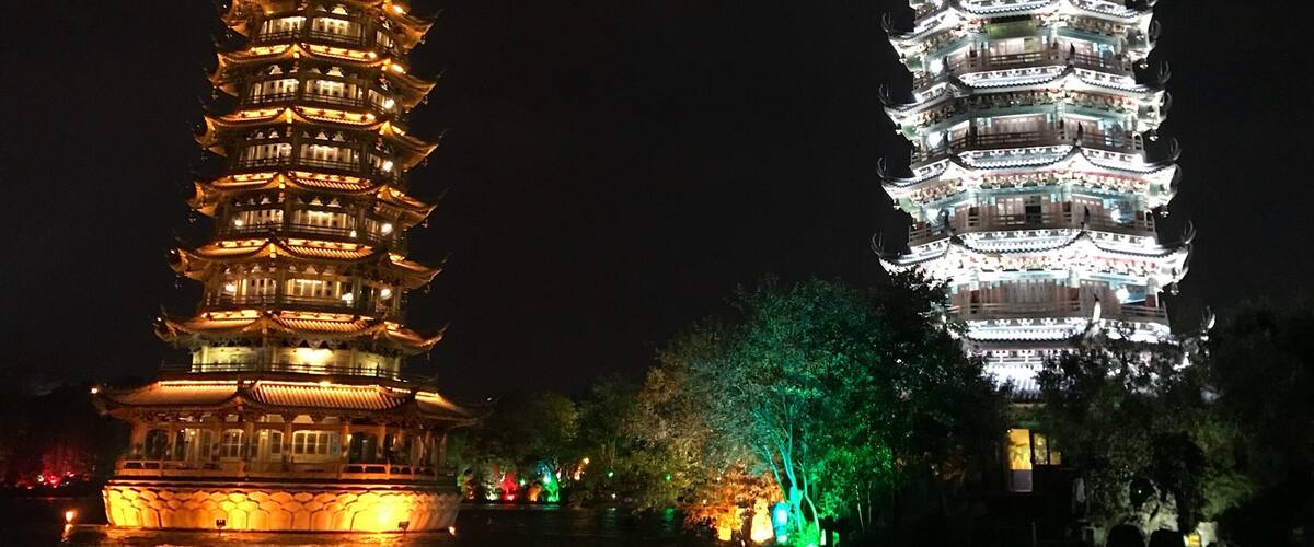 Located in Guilin, Two Rivers and Four Lakes Scenic Spot refer to the landscape - Sun and Moon Pagodas - Mulong Pagoda was built by imitating Longhua Pagoda in Song Dynasty in Shanghai.