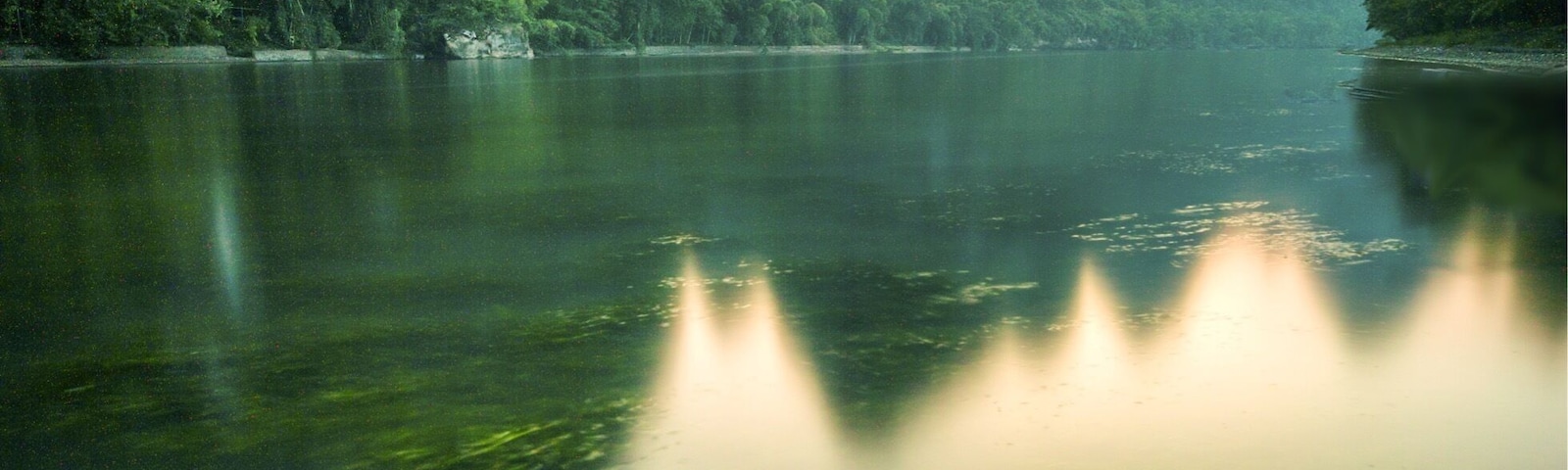 A view of the sunset at XingPing near Yangshuo.  The mountains here are spectacular and are a must see, follow the river out of the town and head towards the first big bend. Wait until sunset and the boats stop creating waves, if not then stick on a ten stop filter and ignore them. 😊, or you can be like me and do both.