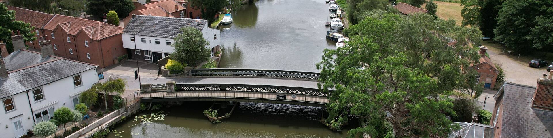 Road bridge Beccles town in Suffolk UK drone aerial view