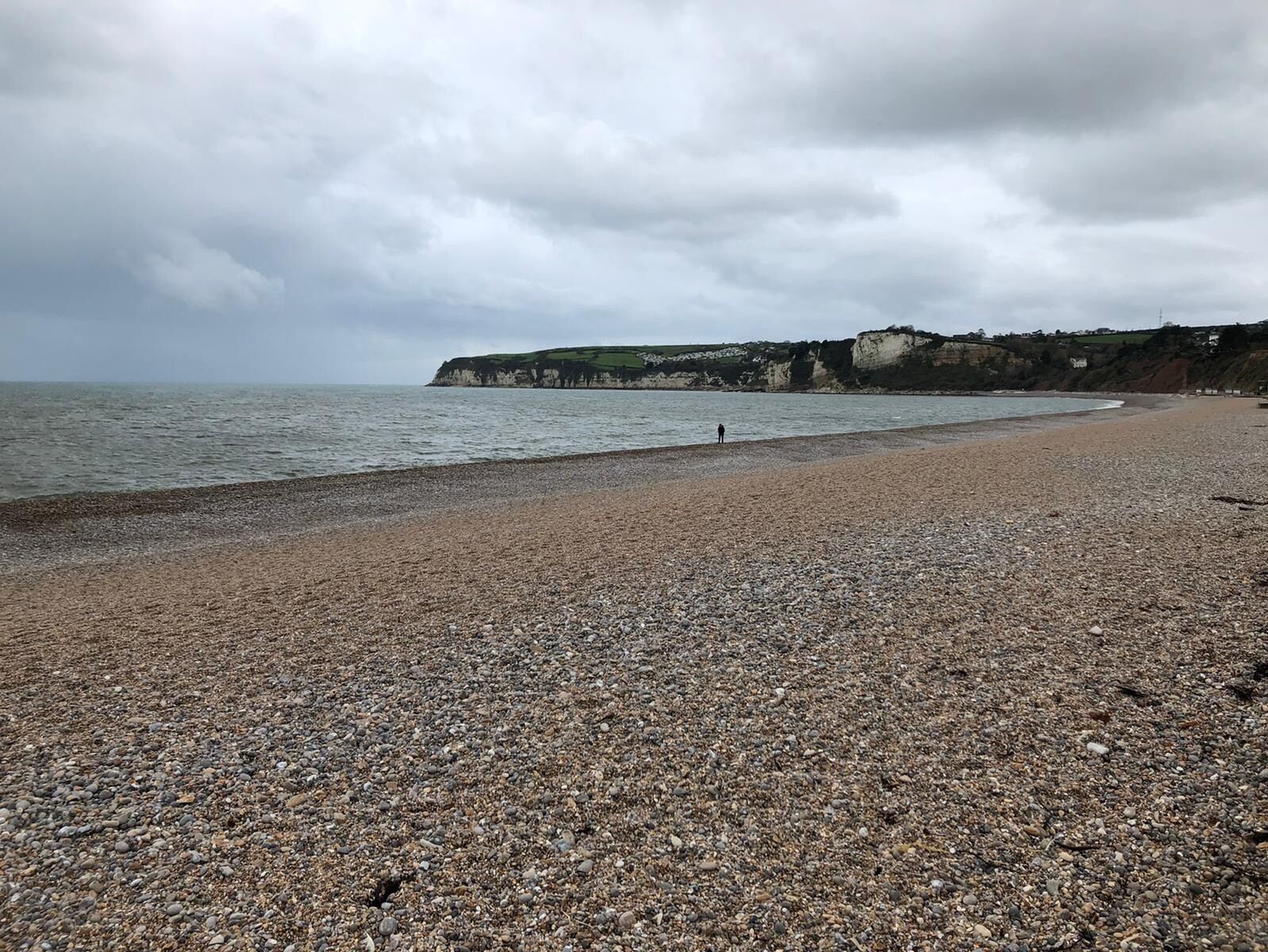 A brisk walk along this raw beach of pebbles and moody sea. It is part of the Jurassic coastline and is beautiful in its own right.