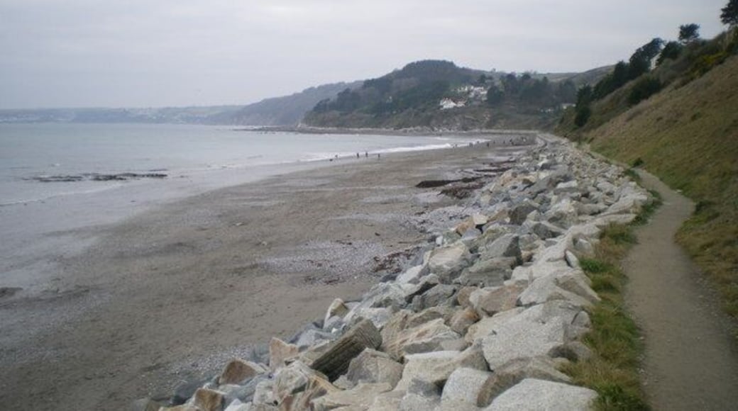 Sea defences and the coast path at Seaton Much of the cliff-bottom at Seaton beach is protected from erosion by these rock defences.
