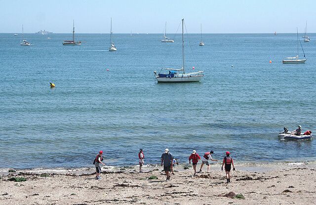 Maker with Rame: Kingsand beach Looking east-south-east with a naval vessel  a frigate or destroyer  on the horizon, left
